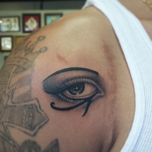 Horus Eye Tattoo On Man Shoulder